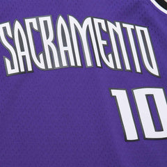 Mitchell & Ness Swingman Jersey Sacramento Kings Mike Bibby Road 02/03 - Purple